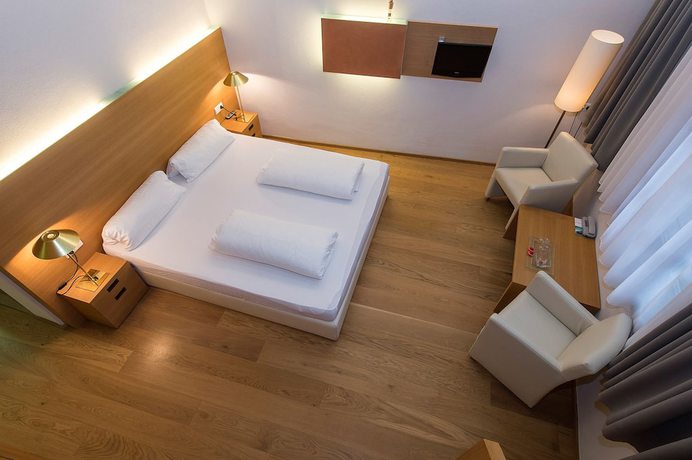 Imagen de la habitación del Hotel Goldener Stern, Mitterdorf - Caldaro di Mezzo. Foto 6