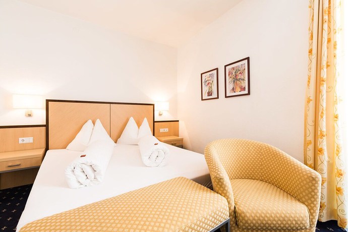 Imagen de la habitación del Hotel Goldener Stern, Mitterdorf - Caldaro di Mezzo. Foto 8