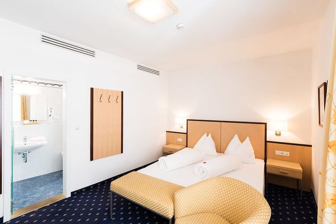 Imagen de la habitación del Hotel Goldener Stern, Mitterdorf - Caldaro di Mezzo. Foto 10
