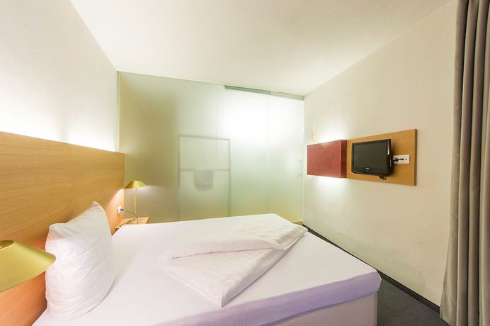 Imagen de la habitación del Hotel Goldener Stern, Mitterdorf - Caldaro di Mezzo. Foto 11