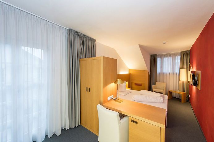 Imagen de la habitación del Hotel Goldener Stern, Mitterdorf - Caldaro di Mezzo. Foto 12