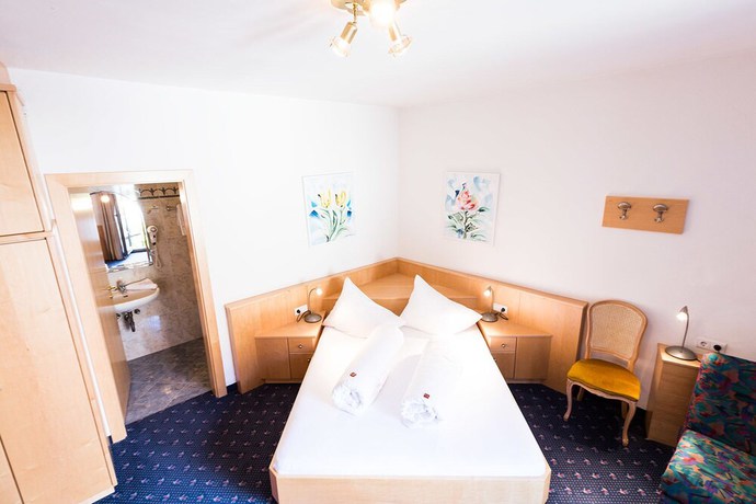 Imagen de la habitación del Hotel Goldener Stern, Mitterdorf - Caldaro di Mezzo. Foto 17