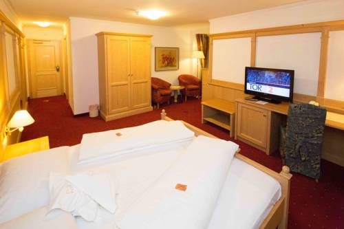 Imagen de la habitación del Hotel Goldenes Roessl. Foto 10