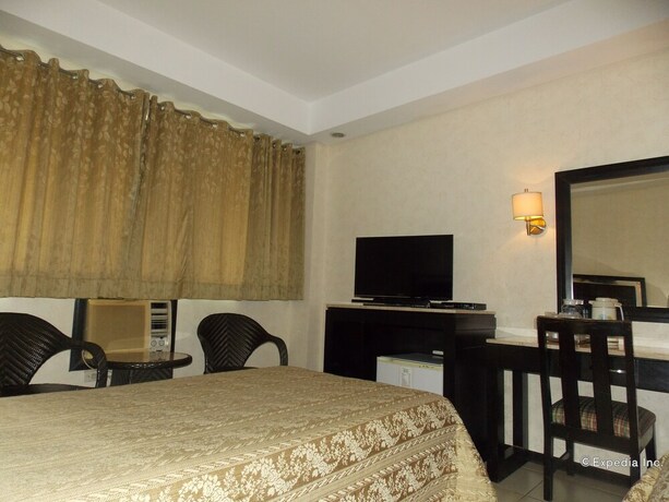 Imagen de la habitación del Hotel Goldenfield Kundutel Hotel. Foto 19