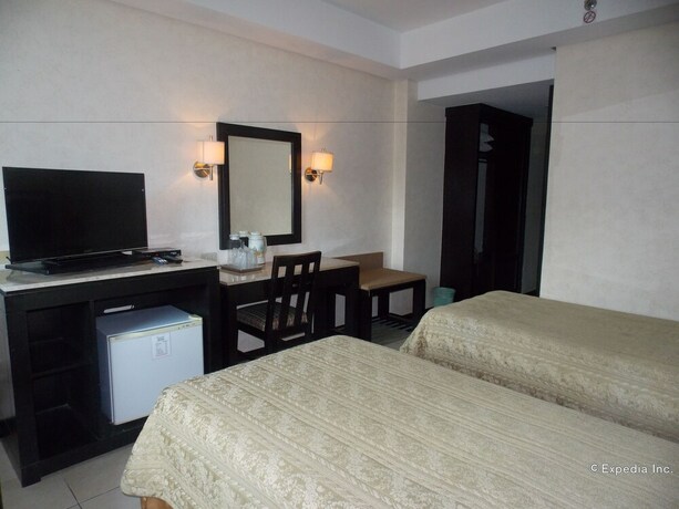 Imagen de la habitación del Hotel Goldenfield Kundutel Hotel. Foto 27
