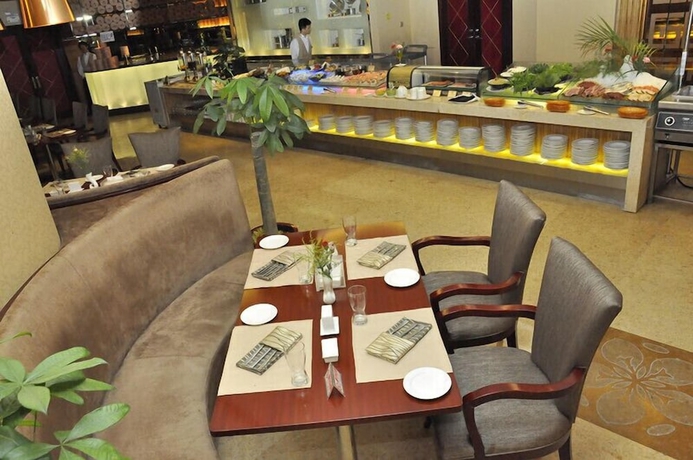 Imagen del bar/restaurante del Hotel Goldenkey Floor Yuexiu. Foto 4