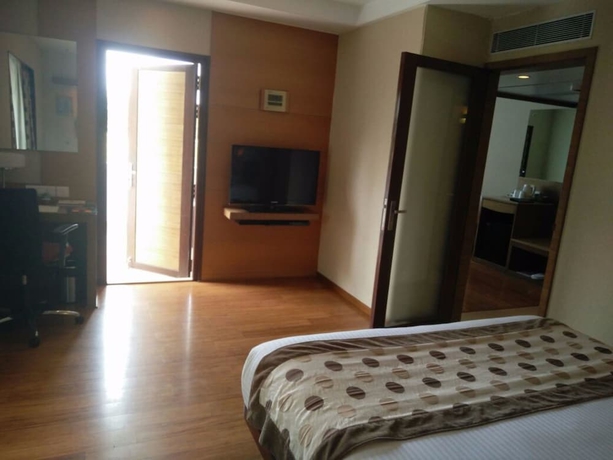 Imagen de la habitación del Hotel Goldfinch Retreat Bangalore. Foto 16