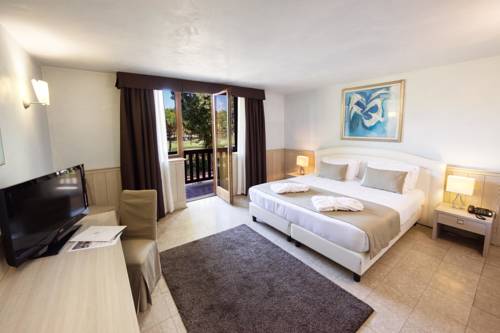 Imagen de la habitación del Hotel Golf Inn. Foto 5