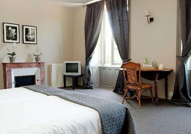 Imagen de la habitación del Hotel Golf de Saint Junien. Foto 12