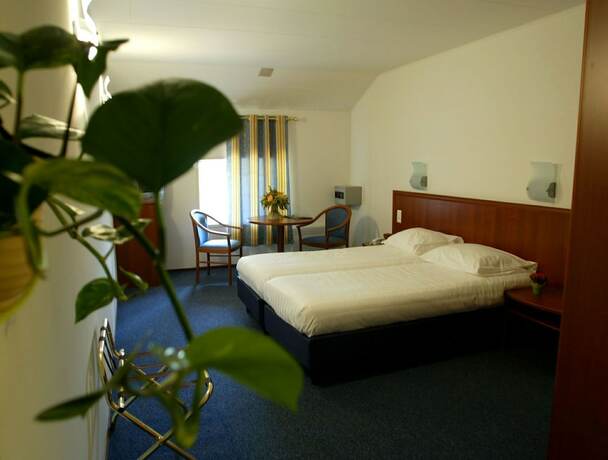 Imagen de la habitación del Hotel Golf de Saint Junien. Foto 14
