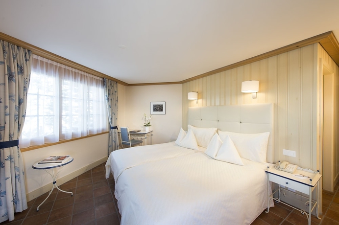 Imagen de la habitación del Hotel Golfhotel Les Hauts De Gstaad and Spa. Foto 14