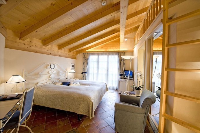 Imagen de la habitación del Hotel Golfhotel Les Hauts De Gstaad and Spa. Foto 17