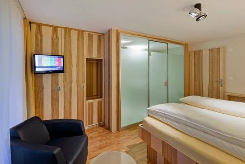 Imagen de la habitación del Hotel Golfhotel Riederhof. Foto 4