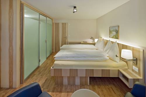 Imagen de la habitación del Hotel Golfhotel Riederhof. Foto 5