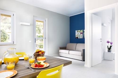 Imagen de la habitación del Hotel Golfo Del Sole Holiday Resort. Foto 12
