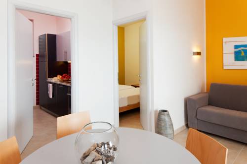 Imagen de la habitación del Hotel Golfo Del Sole Holiday Resort. Foto 13