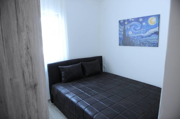 Imagen de la habitación del Hotel Gomakop Apartments. Foto 16