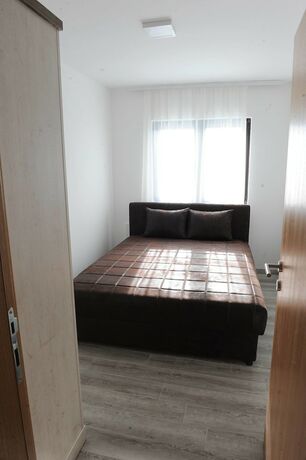 Imagen de la habitación del Hotel Gomakop Apartments. Foto 18