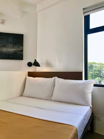 Imagen de la habitación del Hotel Gomez House. Foto 16