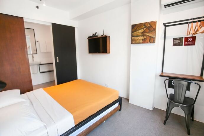 Imagen de la habitación del Hotel Gomez House. Foto 26