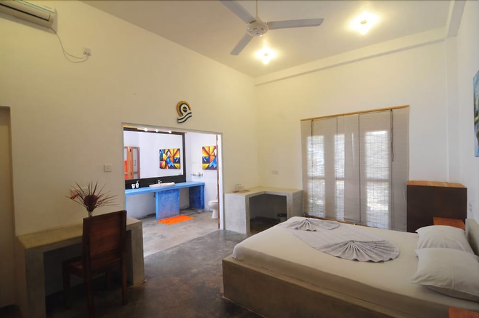 Imagen de la habitación del Hotel Gomez Place. Foto 7