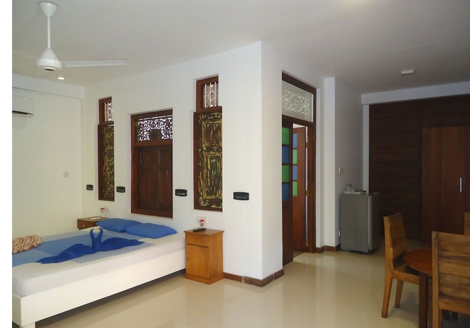 Imagen de la habitación del Hotel Gomez Place. Foto 8