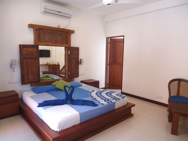 Imagen de la habitación del Hotel Gomez Place. Foto 9