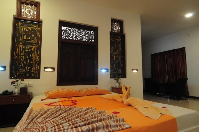 Imagen de la habitación del Hotel Gomez Place. Foto 15