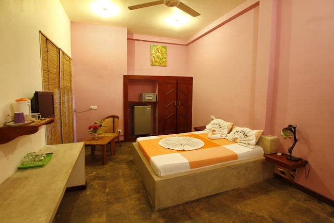 Imagen de la habitación del Hotel Gomez Place. Foto 16