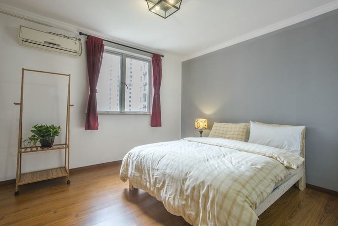 Imagen de la habitación del Hotel Gonative Downtown Apartment Yu Garden. Foto 5