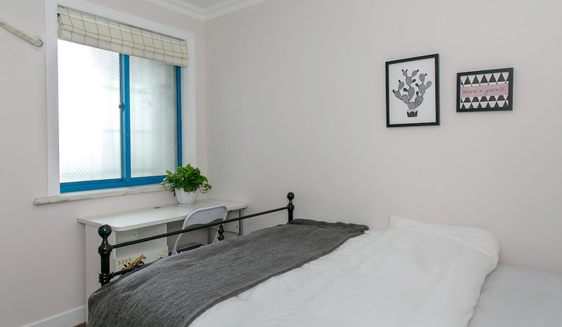 Imagen de la habitación del Hotel Gonative Downtown Apartment Yu Garden. Foto 7
