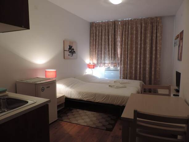Imagen de la habitación del Hotel Gondola Apartments and Suites. Foto 17