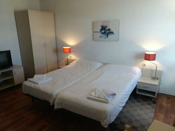 Imagen de la habitación del Hotel Gondola Apartments and Suites. Foto 18
