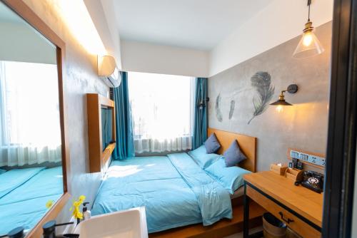 Imagen de la habitación del Hotel Gongxili - Chujian. Foto 11
