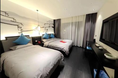 Imagen de la habitación del Hotel Gongxili - Chujian. Foto 19