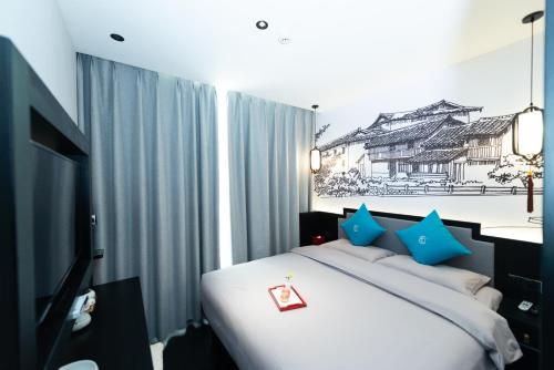 Imagen de la habitación del Hotel Gongxili - Pujian. Foto 17