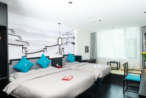 Imagen general del Hotel Gongxili - Pujian. Foto 7