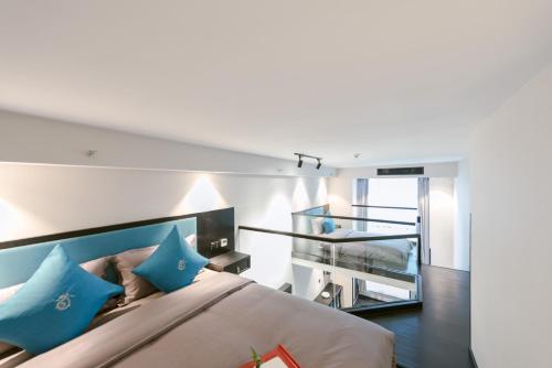 Imagen de la habitación del Hotel Gongxili - Yuejian. Foto 16