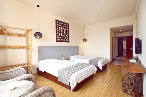 Imagen de la habitación del Hotel Goo Guilin. Foto 1