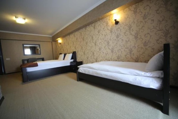 Imagen de la habitación del Hotel Good Aura. Foto 7