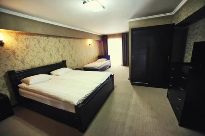 Imagen de la habitación del Hotel Good Aura. Foto 10