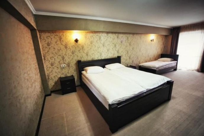 Imagen de la habitación del Hotel Good Aura. Foto 11