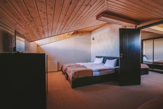 Imagen de la habitación del Hotel Good Aura. Foto 13