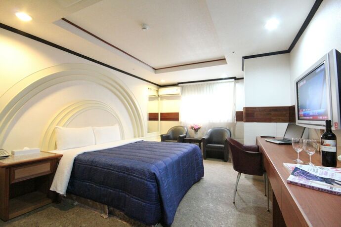 Imagen de la habitación del Hotel Good Friend Business. Foto 4