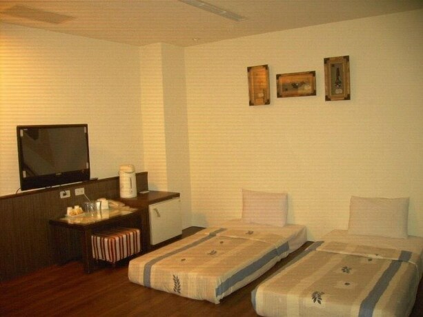 Imagen de la habitación del Hotel Good Ground Tainan. Foto 13