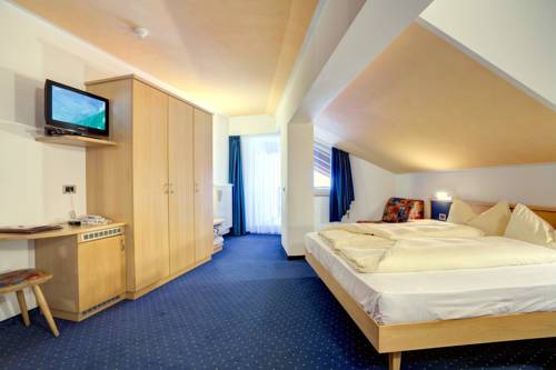 Imagen de la habitación del Hotel Good Life Zirm. Foto 3