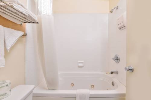 Imagen de la habitación del Hotel Good Living Inn. Foto 6