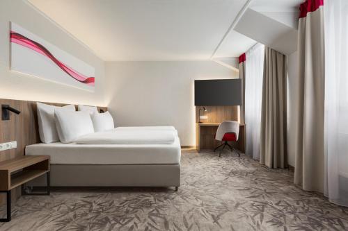 Imagen de la habitación del Hotel Good Morning+ Halle Leipzig. Foto 18