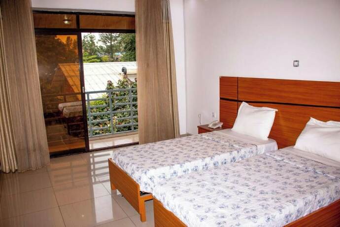 Imagen de la habitación del Hotel Good News Guesthouse. Foto 19
