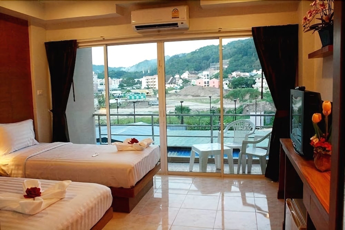 Imagen de la habitación del Hotel Good Nice Patong. Foto 14